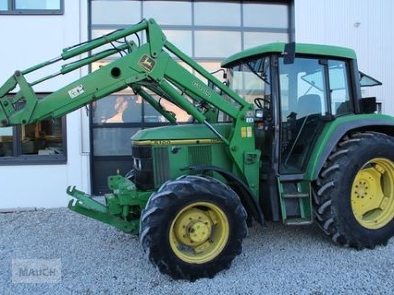 John Deere 6100M + FH+FZW + FL Traktor - Technikboerse.com