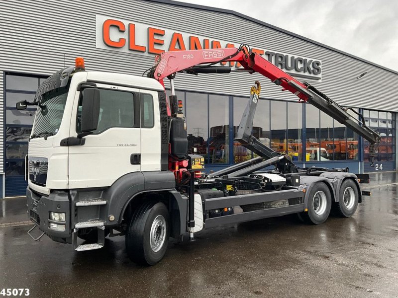 Abrollcontainer del tipo MAN TGS 33.480 6x4 Fassi 15 Tonmeter laadkraan, Gebrauchtmaschine In ANDELST (Immagine 1)