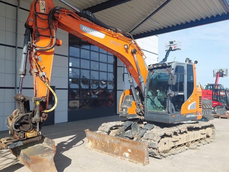 Bagger tipa Doosan DX140, Gebrauchtmaschine u Skive (Slika 1)