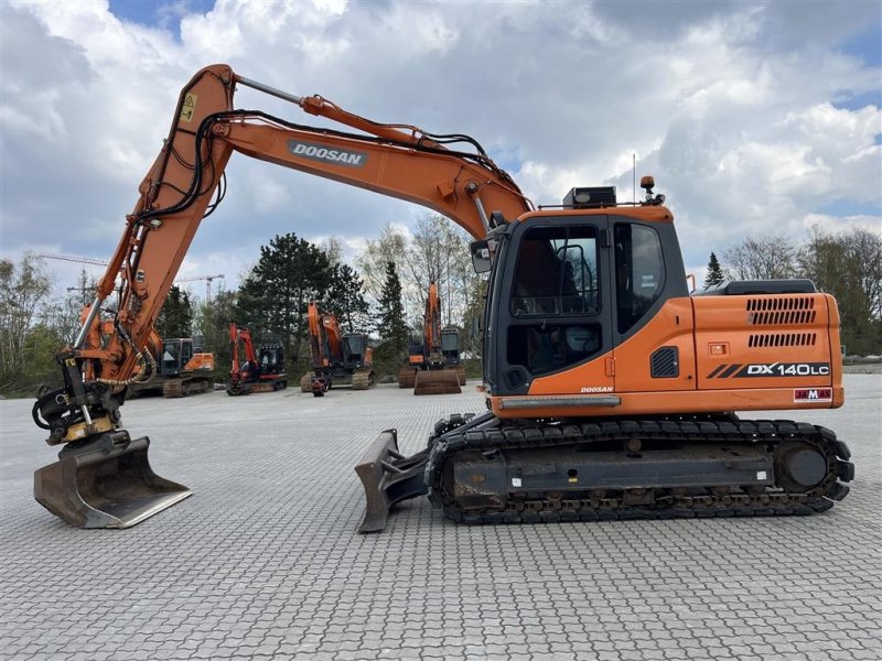 Bagger tipa Doosan DX140LC-3, Gebrauchtmaschine u Kalundborg