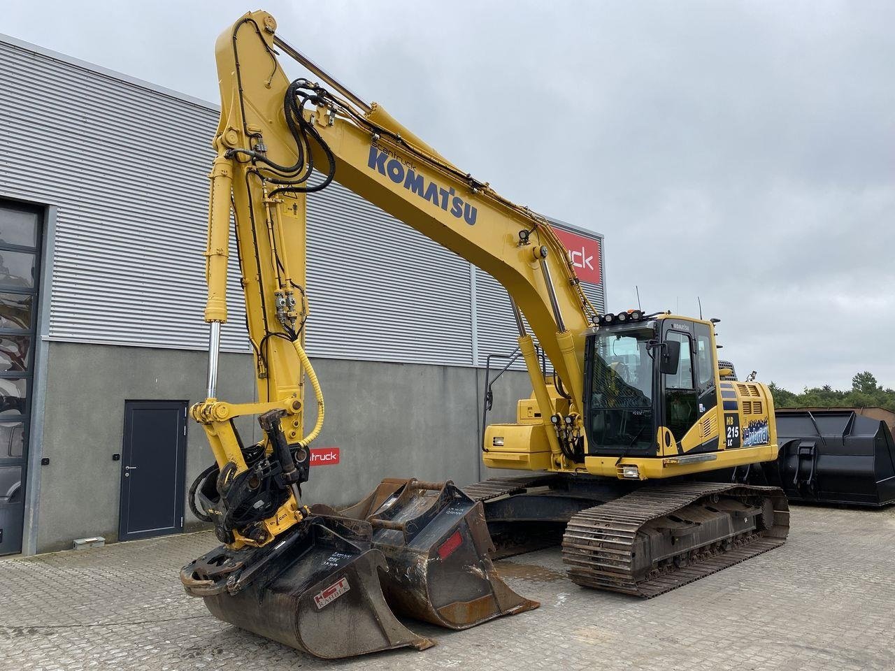 Bagger du type Komatsu HB215LC-3, Gebrauchtmaschine en Skive (Photo 1)