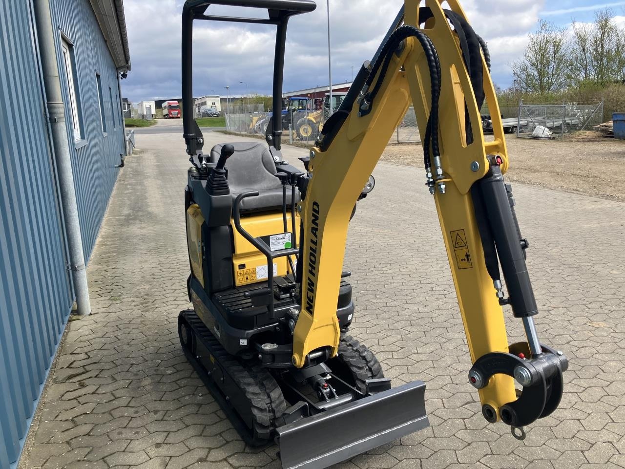 Bagger des Typs New Holland E14D Roll-bar minigraver, Gebrauchtmaschine in Brønderslev (Bild 1)