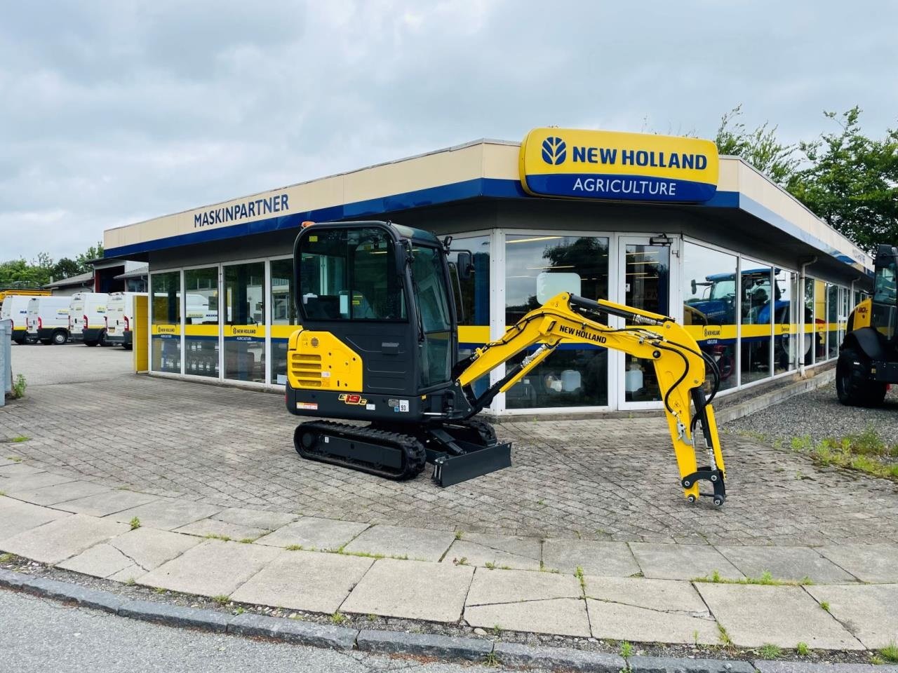 Bagger tipa New Holland E19C, Gebrauchtmaschine u Middelfart (Slika 1)