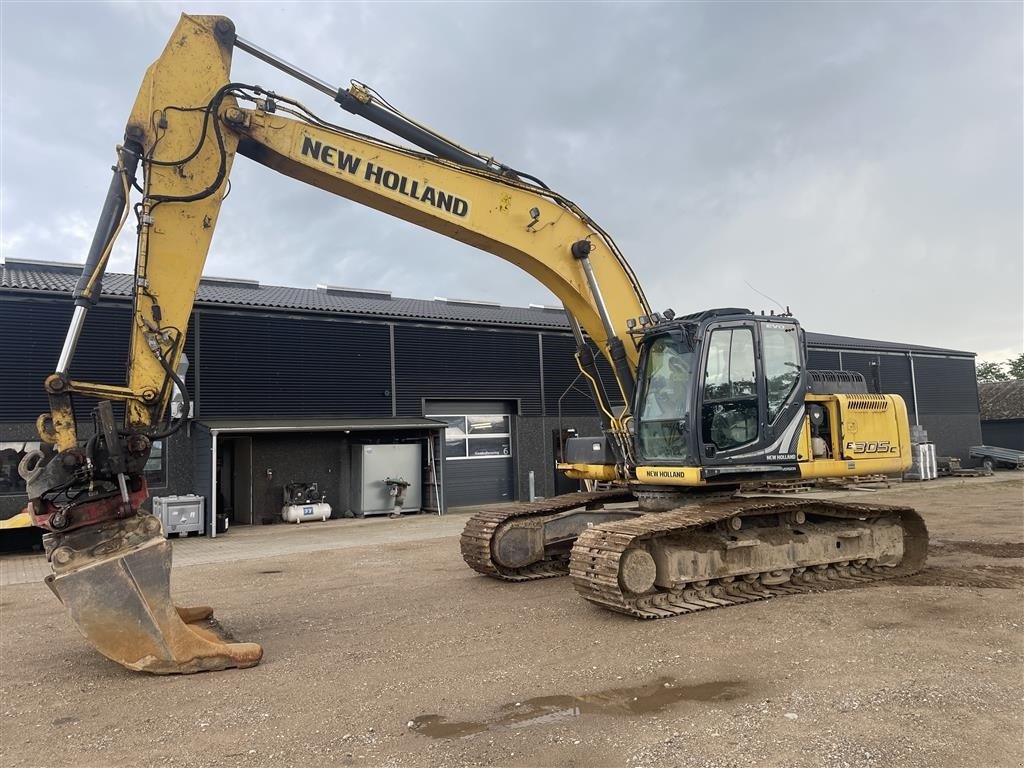 Bagger des Typs New Holland E305 E305C, Gebrauchtmaschine in Roslev (Bild 1)