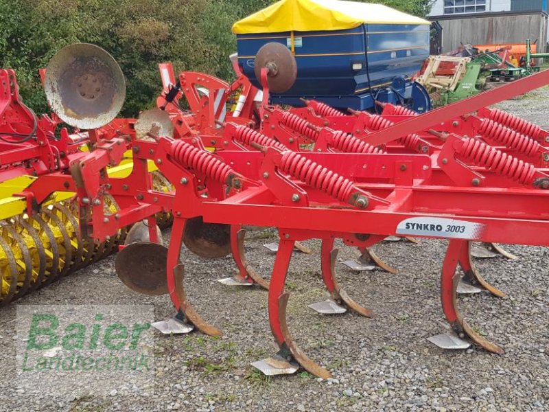 Grubber des Typs Pöttinger Synkro 3003, Gebrauchtmaschine in OBERNDORF-HOCHMOESSINGEN