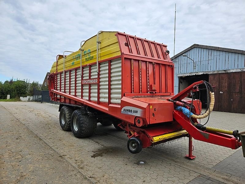 Häcksel Transportwagen van het type Pöttinger Jumbo 6600 mit Dosierwalzen "wenig gelaufen", Gebrauchtmaschine in Honigsee (Foto 1)