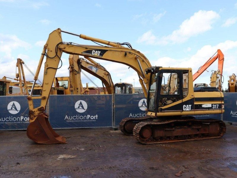 Kettenbagger del tipo Caterpillar 317, Gebrauchtmaschine In Antwerpen (Immagine 1)