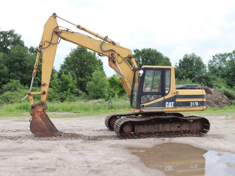 Kettenbagger del tipo Caterpillar 317B, Gebrauchtmaschine en Antwerpen (Imagen 1)