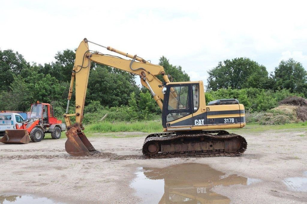 Kettenbagger del tipo Caterpillar 317B, Gebrauchtmaschine en Antwerpen (Imagen 2)