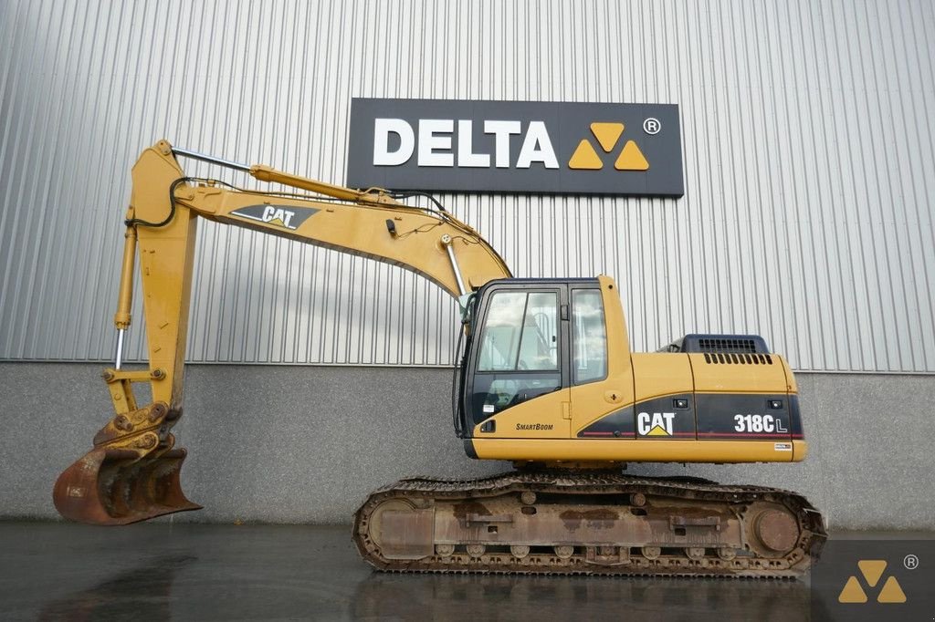 Kettenbagger du type Caterpillar 318CL, Gebrauchtmaschine en Zevenbergen (Photo 1)