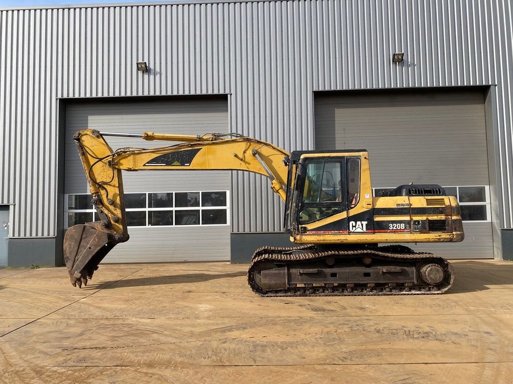 Kettenbagger del tipo Caterpillar 320B, Gebrauchtmaschine In Velddriel (Immagine 1)