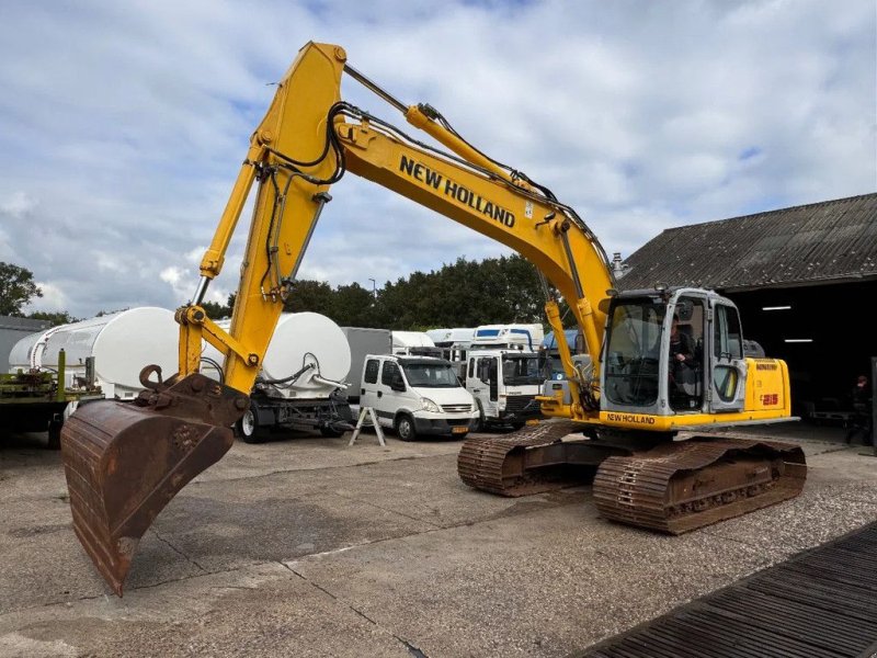 Kettenbagger of the type New Holland E 215 crawler excavator 2008 Dutch machine!!, Gebrauchtmaschine in Saasveld