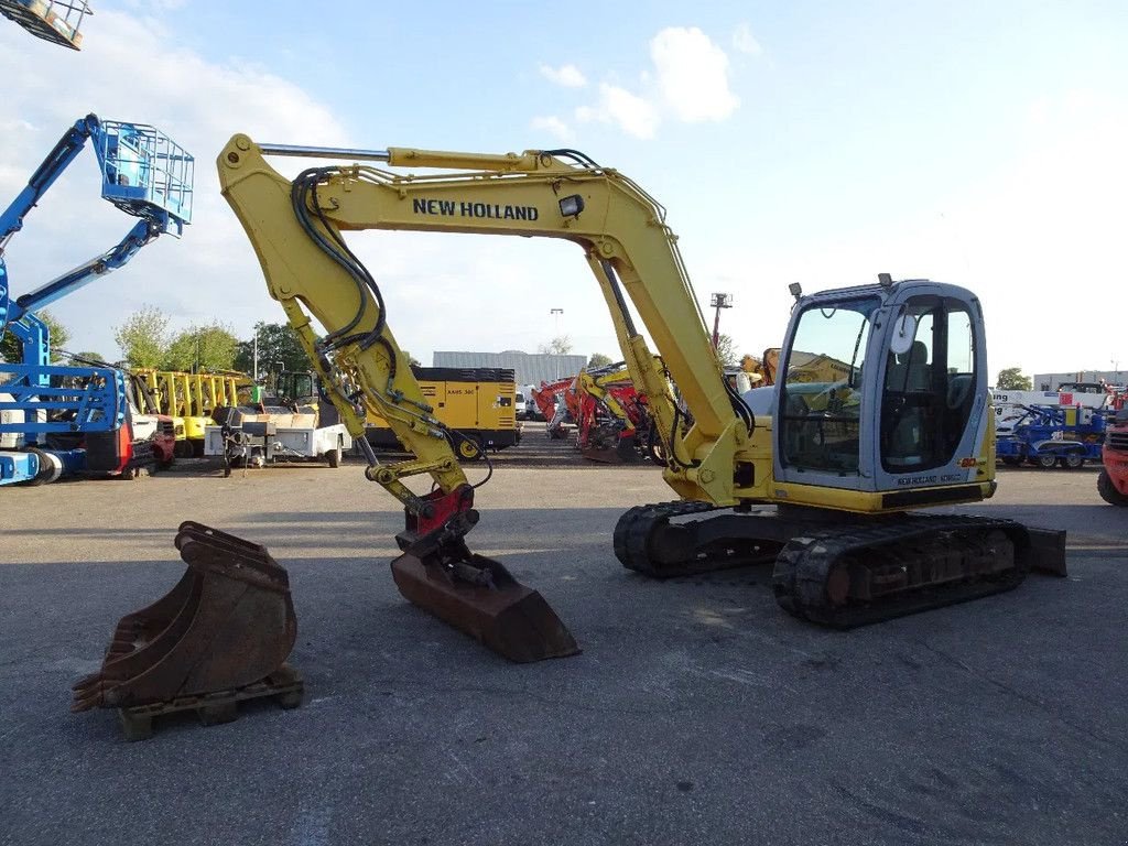 Kettenbagger du type New Holland E80MSR-1ES, Gebrauchtmaschine en Zutphen (Photo 1)