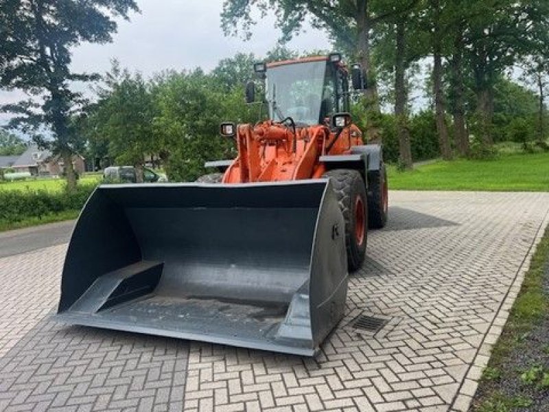 Knickgelenkte Baggerlader des Typs Doosan DL250, Gebrauchtmaschine in Lunteren (Bild 2)