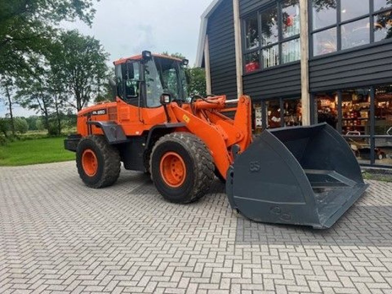 Knickgelenkte Baggerlader of the type Doosan DL250, Gebrauchtmaschine in Lunteren (Picture 1)