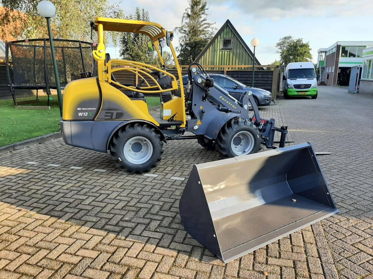 Knickgelenkte Baggerlader van het type Eurotrac W12 MS, Gebrauchtmaschine in Hardegarijp (Foto 2)