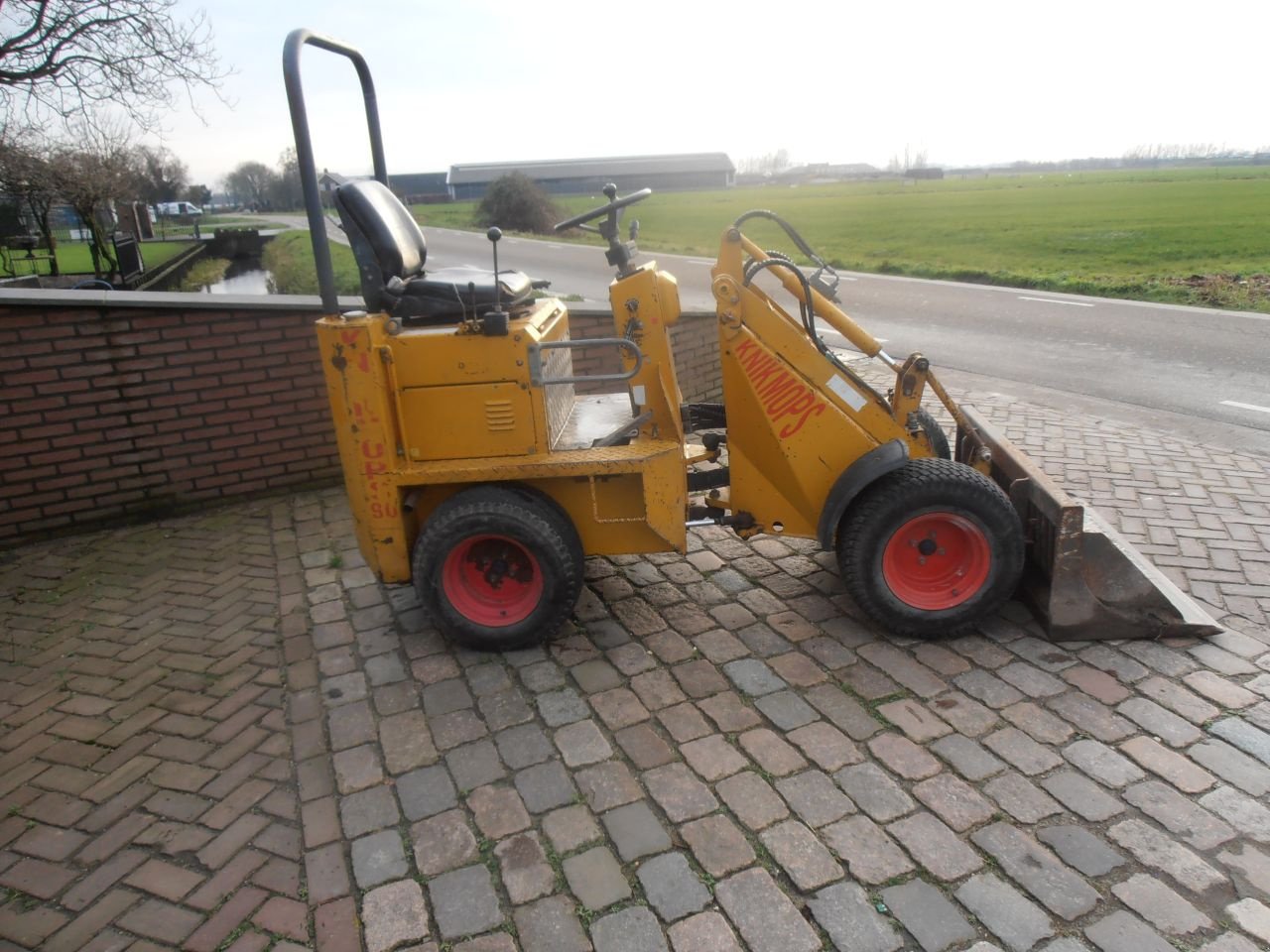 Knickgelenkte Baggerlader van het type Knikmops 90, Gebrauchtmaschine in Kerkdriel (Foto 2)