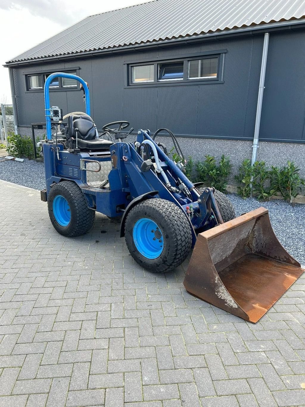 Knickgelenkte Baggerlader van het type Knikmops KM130, Gebrauchtmaschine in Hedel (Foto 2)