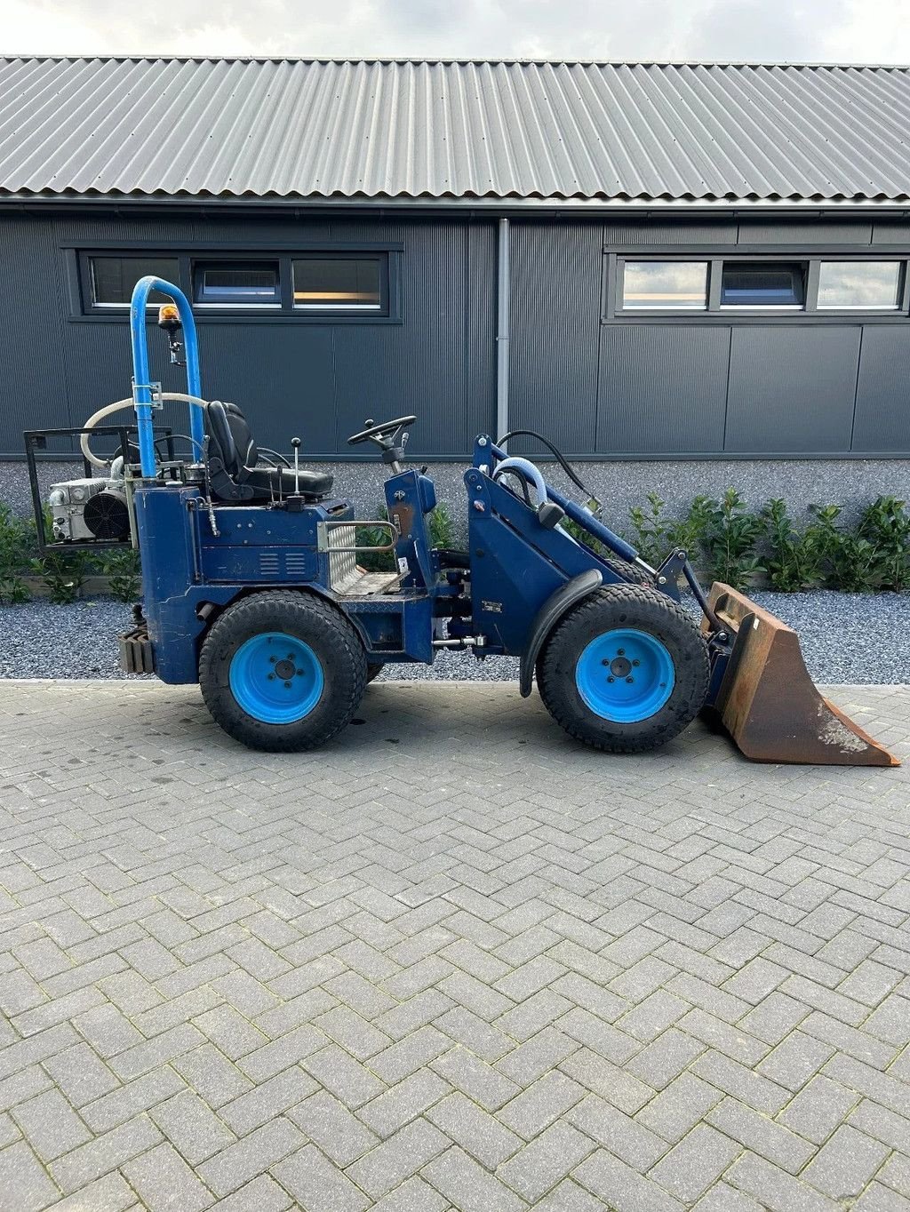 Knickgelenkte Baggerlader van het type Knikmops KM130, Gebrauchtmaschine in Hedel (Foto 7)