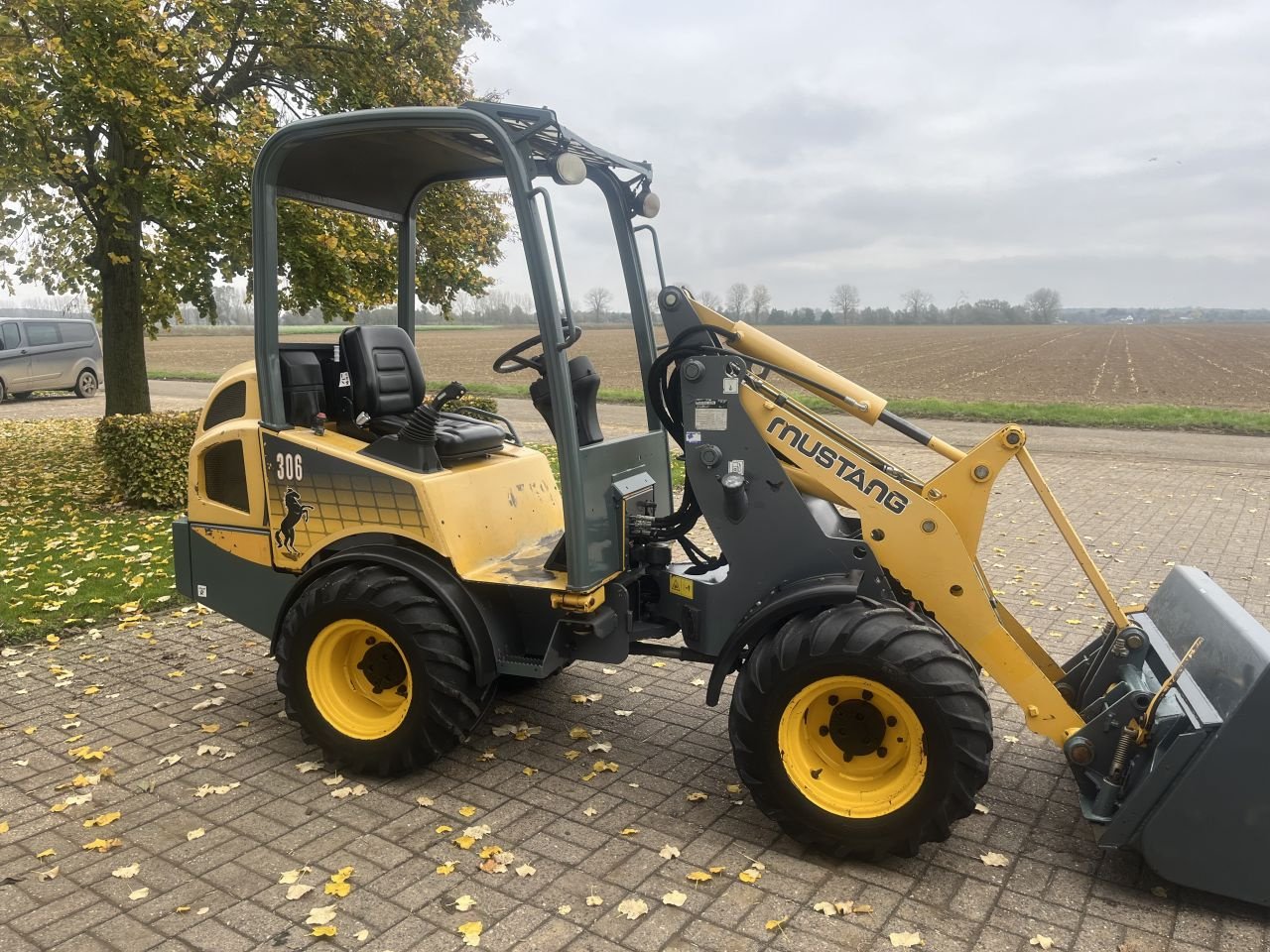 Knickgelenkte Baggerlader van het type Mustang AL306, Gebrauchtmaschine in Buggenum (Foto 5)