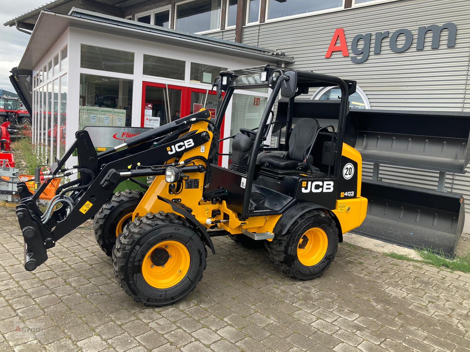 Kompaktlader typu JCB 403, Neumaschine v Münsingen (Obrázek 1)