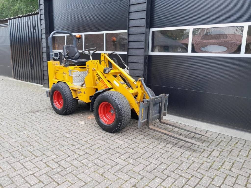 Kompaktlader van het type Knikmops 130 minishovel met bak vorken bezem tegelriek, Gebrauchtmaschine in Ederveen (Foto 10)