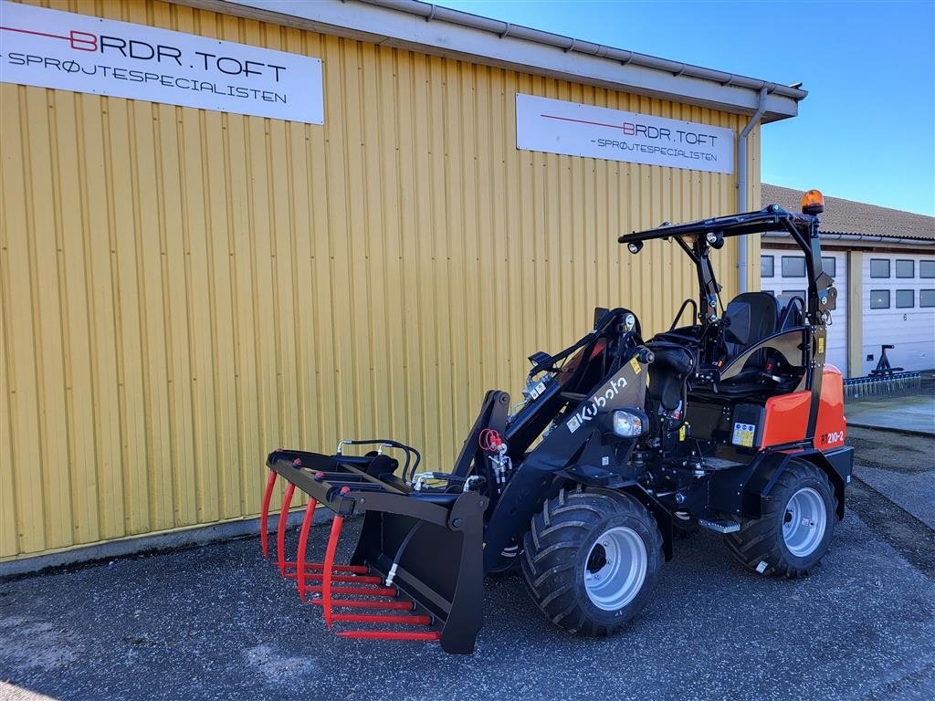 Kompaktlader του τύπου Kubota RT210-2 Inkl skovl og pallegafler, Gebrauchtmaschine σε Sabro (Φωτογραφία 1)