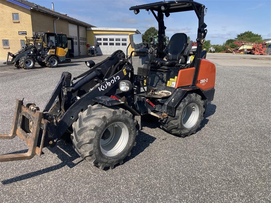 Kompaktlader tipa Kubota RT280-2 Skovl og gafler foldetag 4 arbejdslys og trafiklys, Gebrauchtmaschine u Sabro (Slika 1)