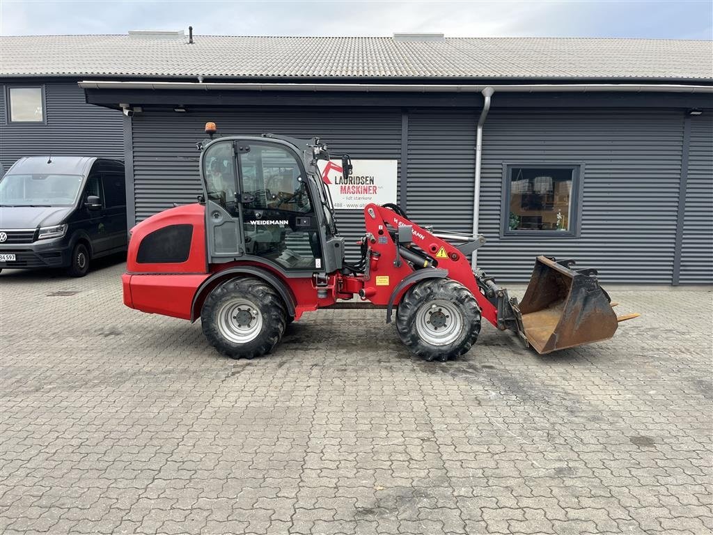 Kompaktlader van het type Weidemann  2080 lukket kabine skovl og gafler, Gebrauchtmaschine in Rønnede (Foto 1)