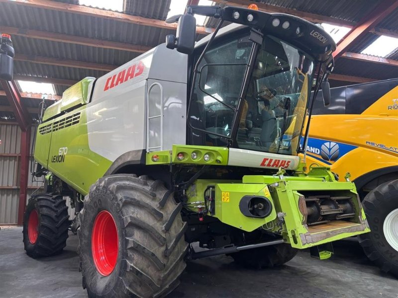 Mähdrescher του τύπου CLAAS LEXION 670 4WD. Incl. Skærebord Vario V770. GPS. Laser. CEMOS Cruise Pilot. 3D. XL Snegl. Profi Cam. S7 Terminal. Quantimeter. Ring til Ulrik på 40255544. Jeg snakker Jysk., Gebrauchtmaschine σε Kolding (Φωτογραφία 1)