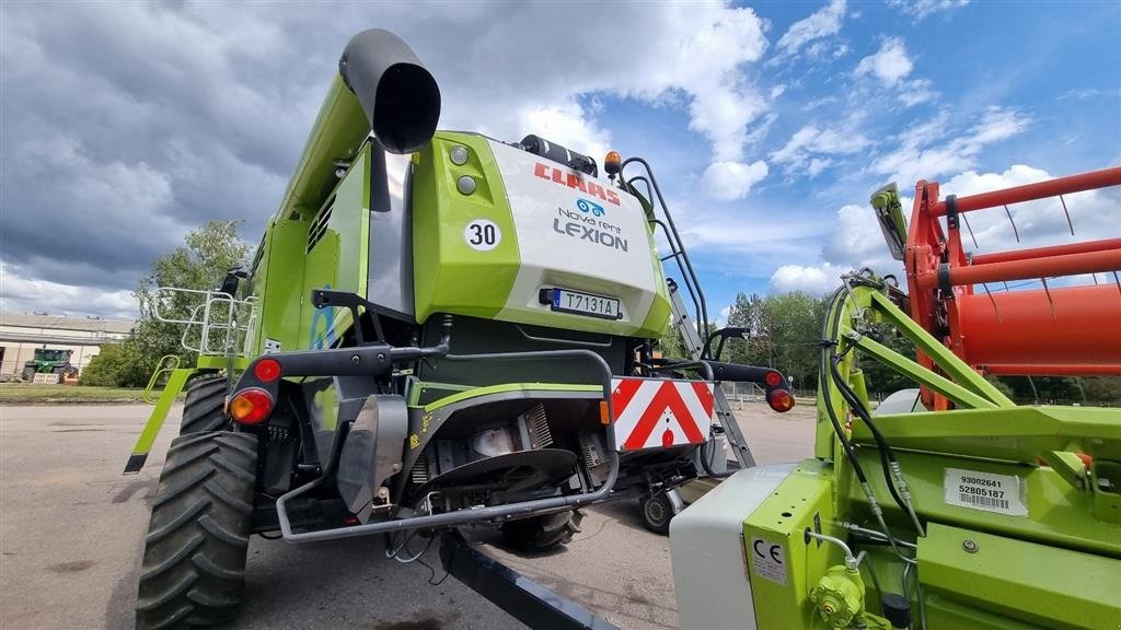 Mähdrescher des Typs CLAAS LEXION 670 Incl. Skærebord Vario V770. 4WD. CEMOS Cruise Pilot. 3D. XL Snegl. Profi Cam. S7 Terminal. Quantimeter. Ring til Ulrik på 40255544. Jeg snakker Jysk., Gebrauchtmaschine in Kolding (Bild 2)