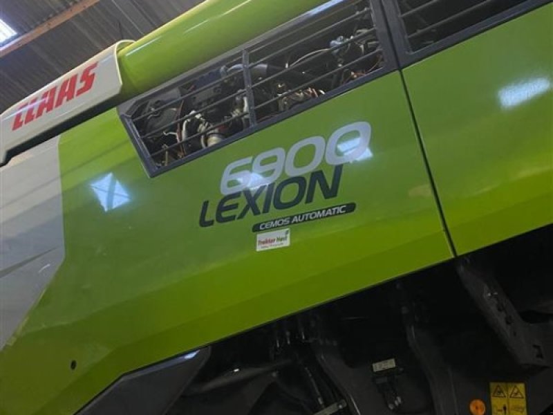 Mähdrescher typu CLAAS Lexion 6900 4WD med MacDon 35 fod flex skærebord, Gebrauchtmaschine w Grindsted (Zdjęcie 1)