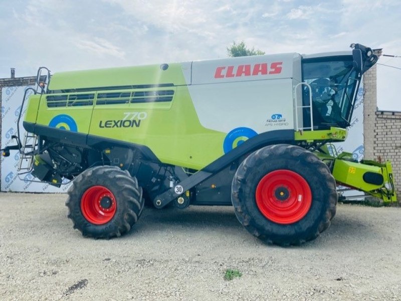 Mähdrescher of the type CLAAS LEXION 770 Incl. skærebord V1050. CEMOS Auto Cleaning. CEMOS Auto Seperation. . Cruise Pilot. Telematics mm. Ring til Ulrik på 40255544. Jeg snakker Jysk., Gebrauchtmaschine in Kolding (Picture 1)