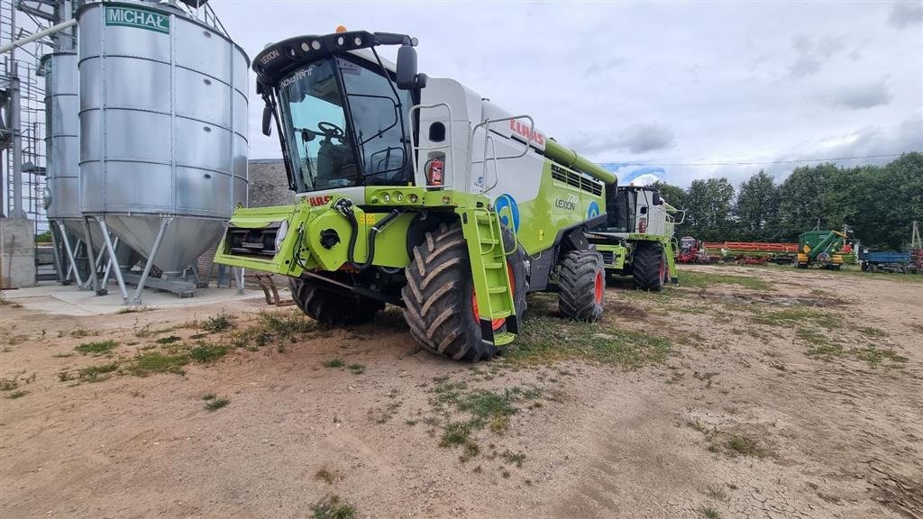 Mähdrescher typu CLAAS LEXION 770 Udlejet. Sælges efter høst. Ring for info. Incl Vario V1230 bord. GPS. Cruise Pilot. CEMOS Auto Cleaning. CEMOS Auto Separation., Gebrauchtmaschine v Kolding (Obrázek 1)
