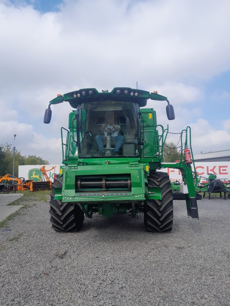 Mähdrescher du type John Deere T 560i, Neumaschine en Mrągowo (Photo 2)