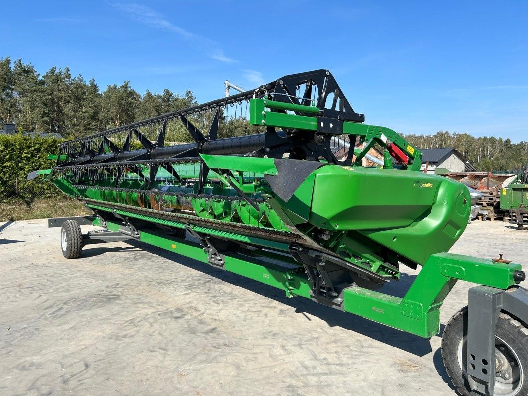 Mähdrescher van het type John Deere T660i, Gebrauchtmaschine in Mrągowo (Foto 21)