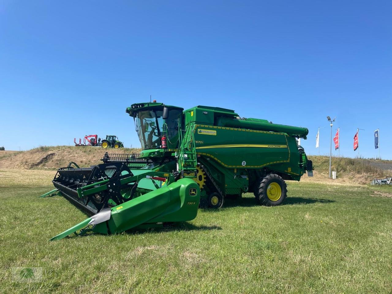 Mähdrescher of the type John Deere T670 HM, Gebrauchtmaschine in Hofheim (Picture 1)