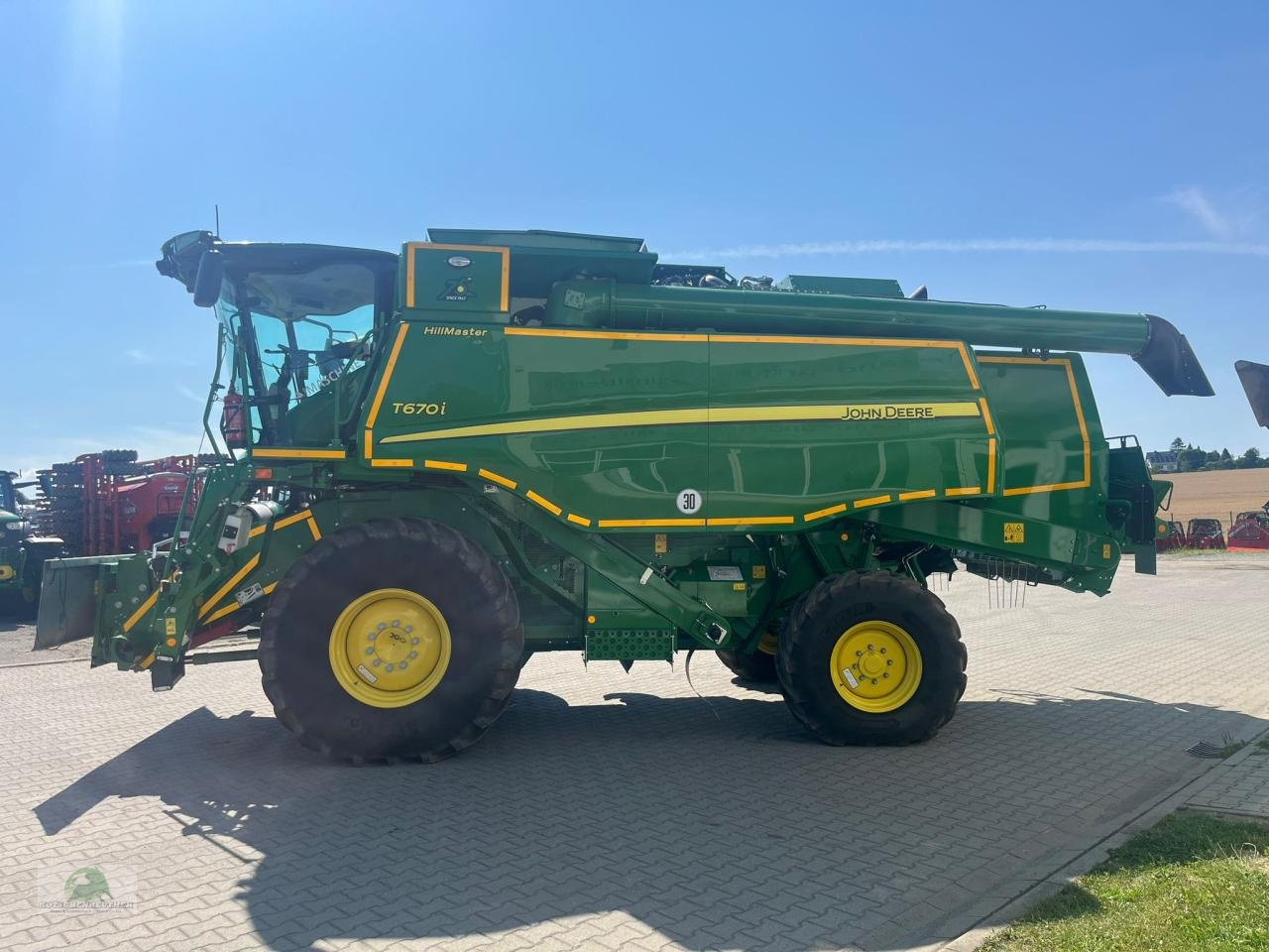 Mähdrescher of the type John Deere T670 HM, Neumaschine in Triebes (Picture 1)