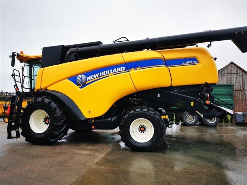 Mähdrescher του τύπου New Holland CX8070 Elevation Med Vari-Feed skærebord og vogn. Elevation model. Giv et bud! Ring til Ulrik for mere info på 40255544. Jeg snakker Jysk, tysk og engelsk., Gebrauchtmaschine σε Kolding (Φωτογραφία 1)