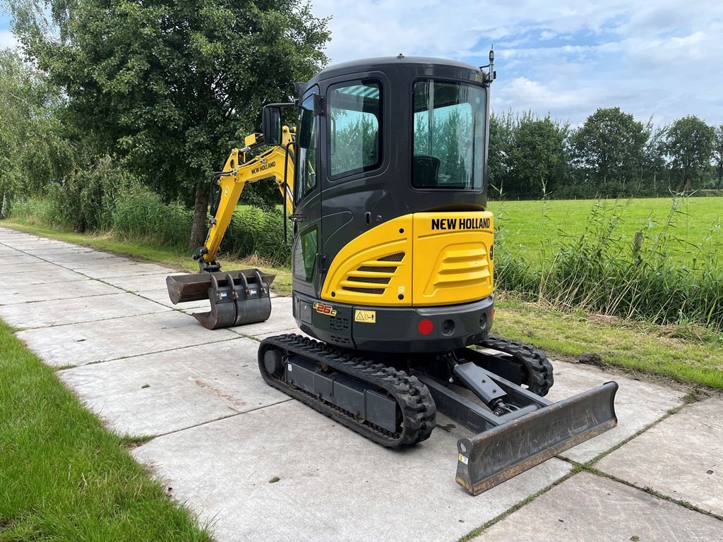 Minibagger of the type New Holland E26C minigraver, Neumaschine in Lunteren (Picture 6)