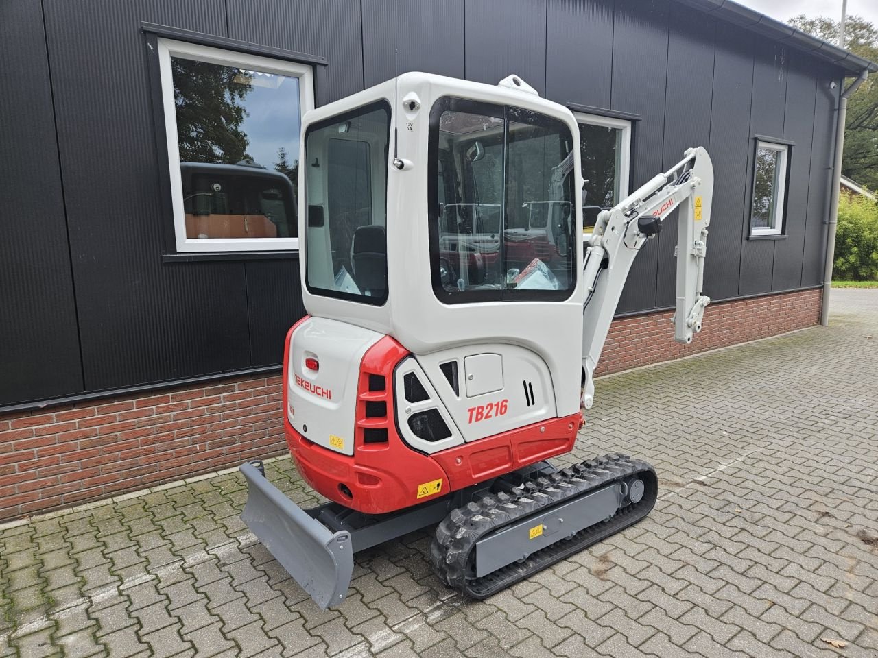 Minibagger van het type Takeuchi TB216, Neumaschine in Haaksbergen (Foto 10)