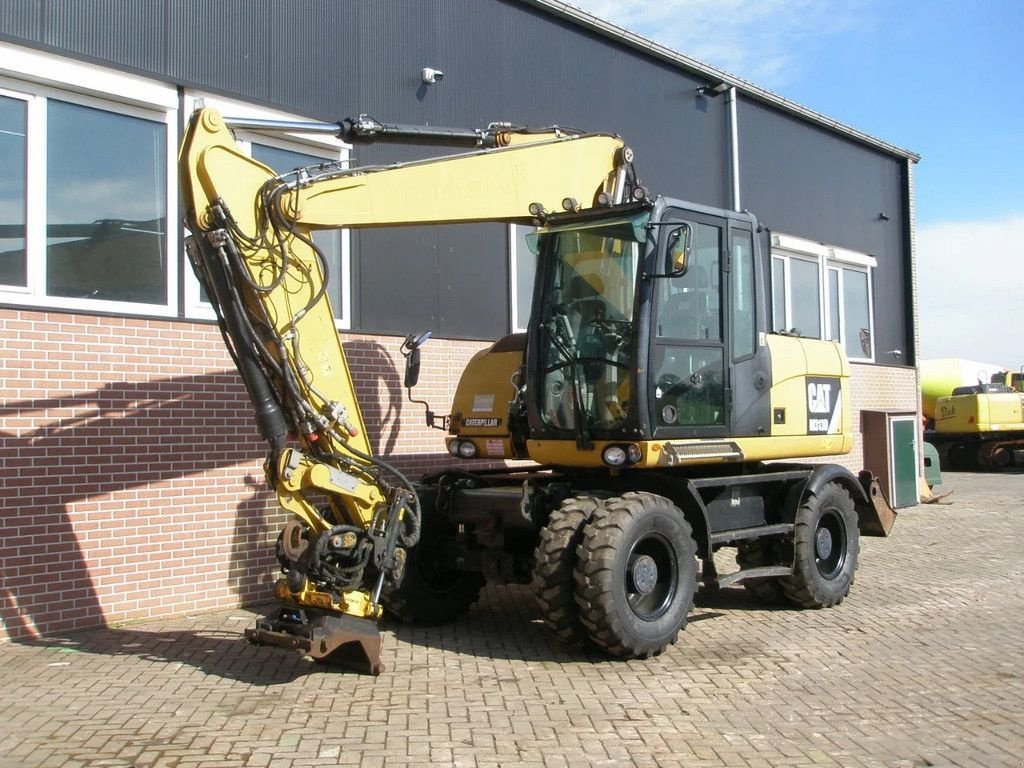 Mobilbagger tip Caterpillar M313D, Gebrauchtmaschine in Barneveld (Poză 1)