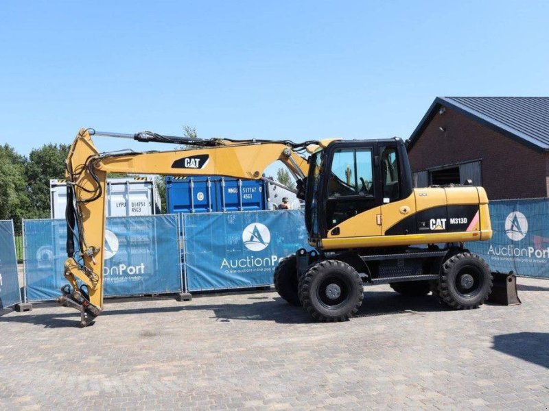 Mobilbagger del tipo Caterpillar M313D, Gebrauchtmaschine en Antwerpen (Imagen 1)