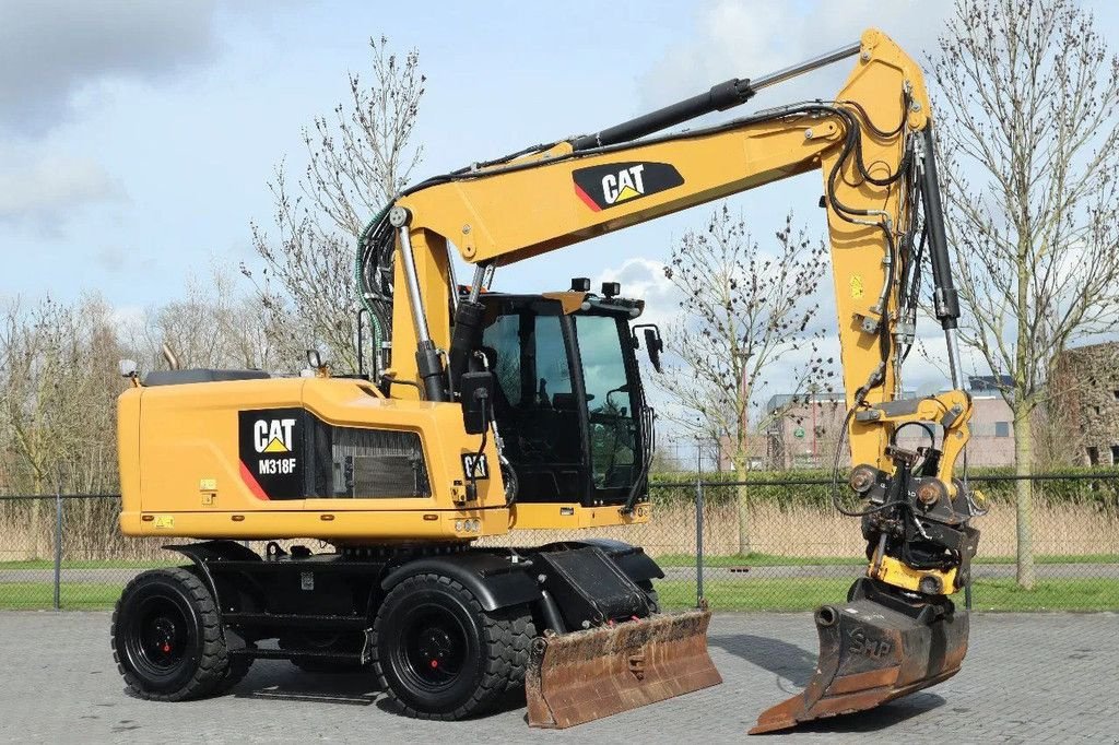 Mobilbagger of the type Caterpillar M318 F ROTOTILT BUCKET TRAILER HYDR BSS, Gebrauchtmaschine in Marknesse (Picture 5)