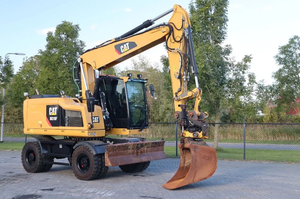 Mobilbagger van het type Caterpillar M318 F ROTOTILT BUCKET TRAILER HYDR BSS, Gebrauchtmaschine in Marknesse (Foto 5)