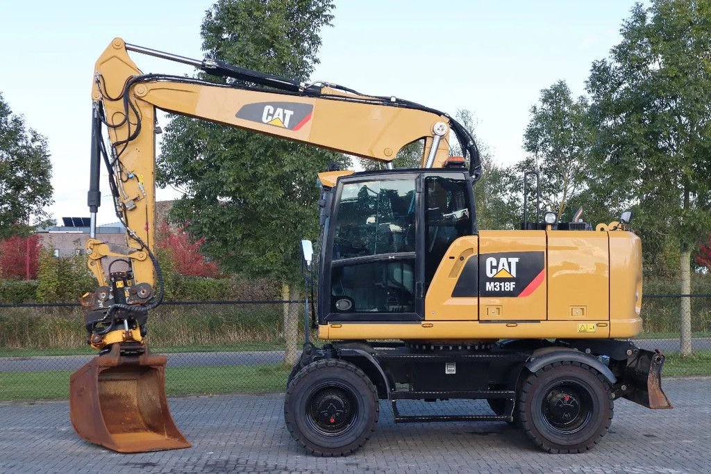 Mobilbagger a típus Caterpillar M318 F ROTOTILT BUCKET TRAILER HYDR BSS, Gebrauchtmaschine ekkor: Marknesse (Kép 1)