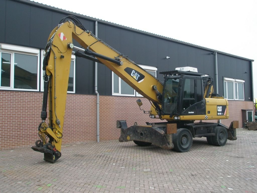 Mobilbagger of the type Caterpillar M318D, Gebrauchtmaschine in Barneveld (Picture 1)