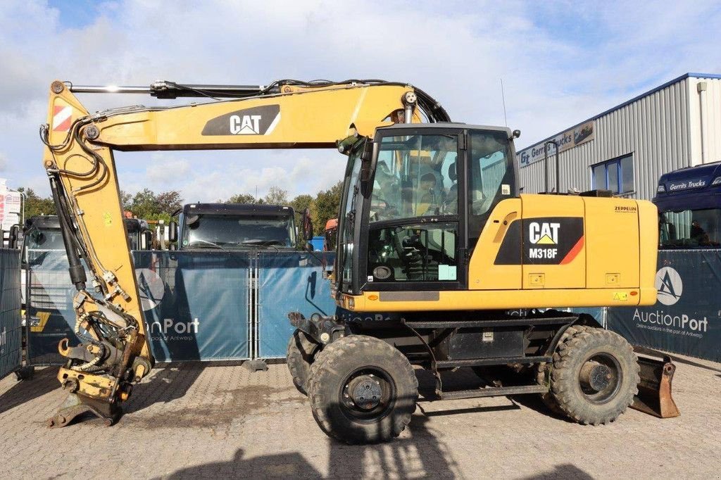 Mobilbagger du type Caterpillar M318F, Gebrauchtmaschine en Antwerpen (Photo 1)