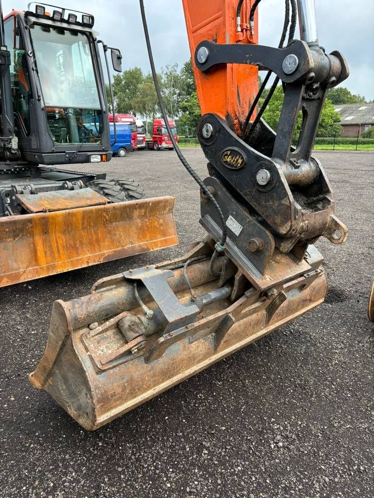 Mobilbagger типа Doosan DX 140 W-5 tilt bucket wheeled excavator like new., Gebrauchtmaschine в Erp (Фотография 11)