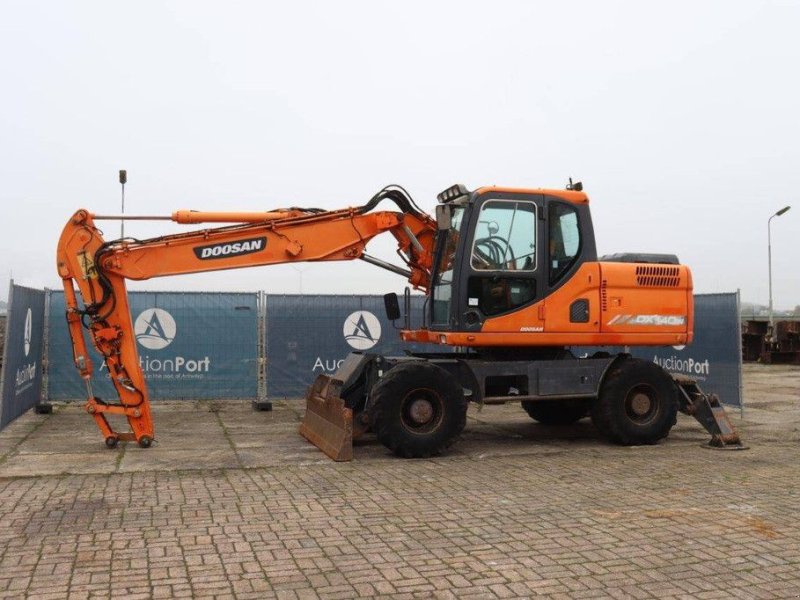 Mobilbagger del tipo Doosan DX 140W, Gebrauchtmaschine In Antwerpen (Immagine 1)